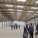 Visitors and business people tour a factory building on a U.N. organised trip to Senegal's new Diamniadio industrial park in Senegal November 15, 2016.